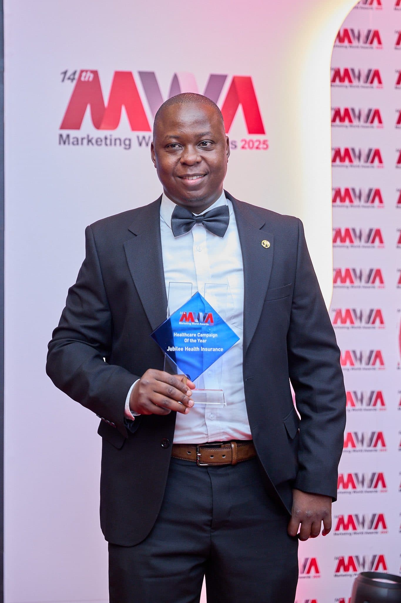 An executive recognised on stage at the Marketing World Awards
